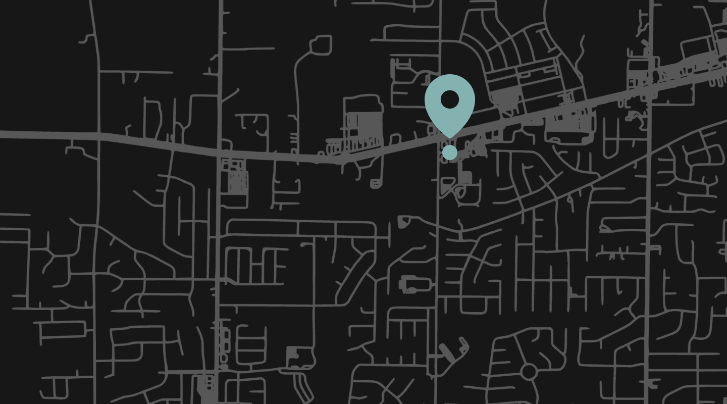 Talbert Family Dentistry | Stylized black and gray street map with a teal location pin marking the dental office.